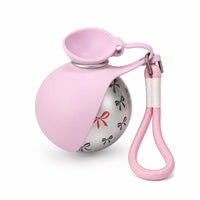 Nuvia Pets botella rosa con estampado de pajaritas